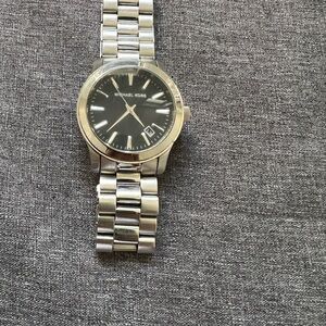 Michael Kors Black Dial Silver Bracelet Watch needs battery